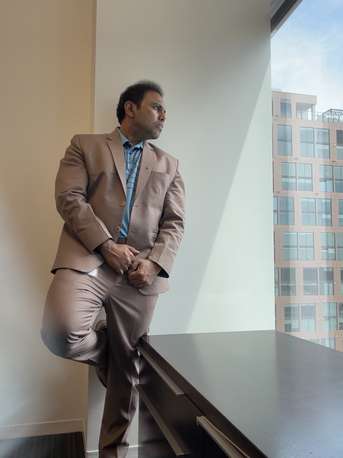 Sai after transformation in executive attire